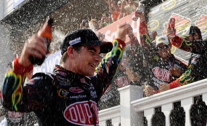 Jeff Gordon celebrates winning the 5 -Hour Energy 500 at Pocono Raceway, his record-tying 5th victory at the track. Credit: John Harrelson/Getty Images for NASCAR